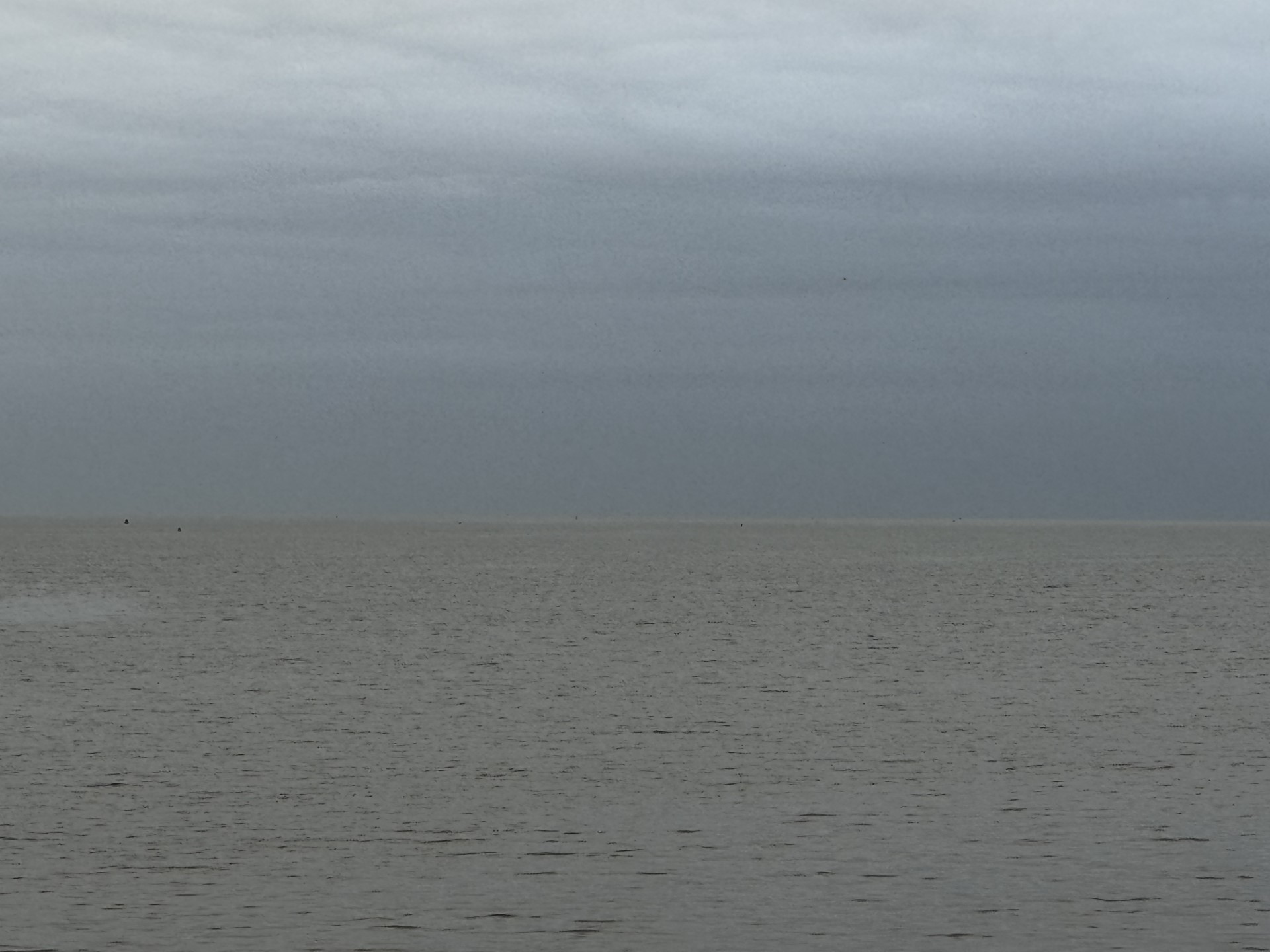 Grey sky and sea horizon
